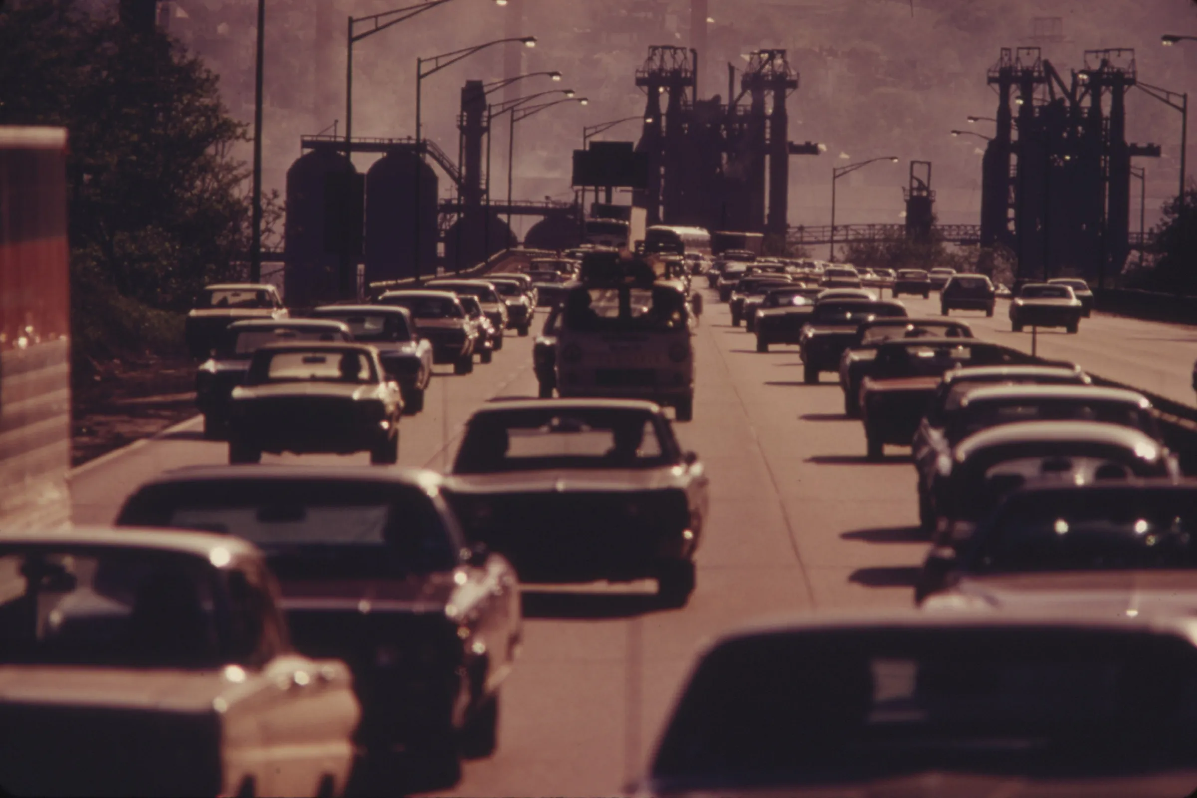 Cars in traffic on a busy road